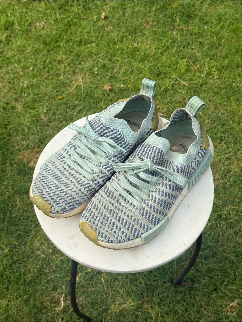Adidas Originals NMD_R1 STLT Primeknit sneakers in an Ash Green